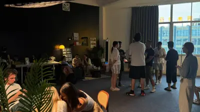Attendees chatting around the studio during the Guangzhou gathering.