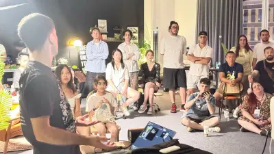 The Guangzhou audience listening to Lemphek, seen from beside his laptop.